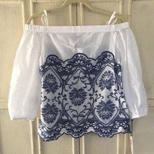 White blouse with blue detailing